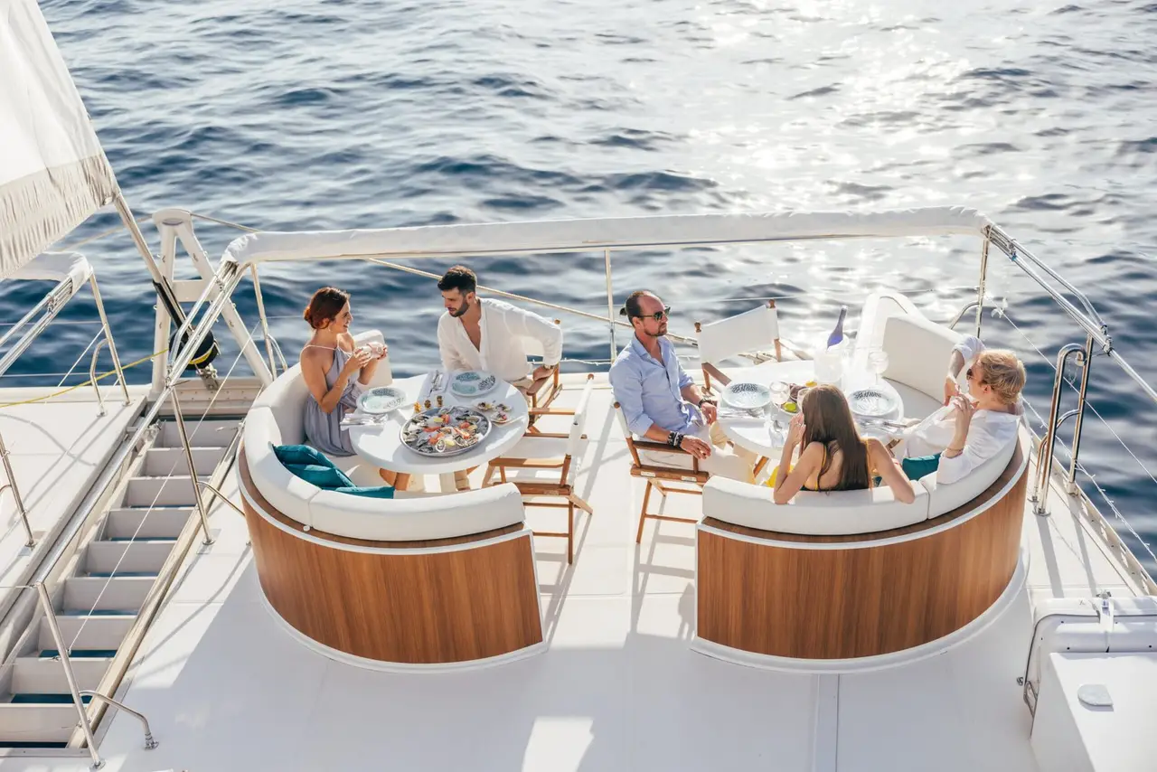 Manana Yacht, main deck — Barcelona Yacht Rental, Barcelona. Sitges swims and shoreline lunches at an easy pace
