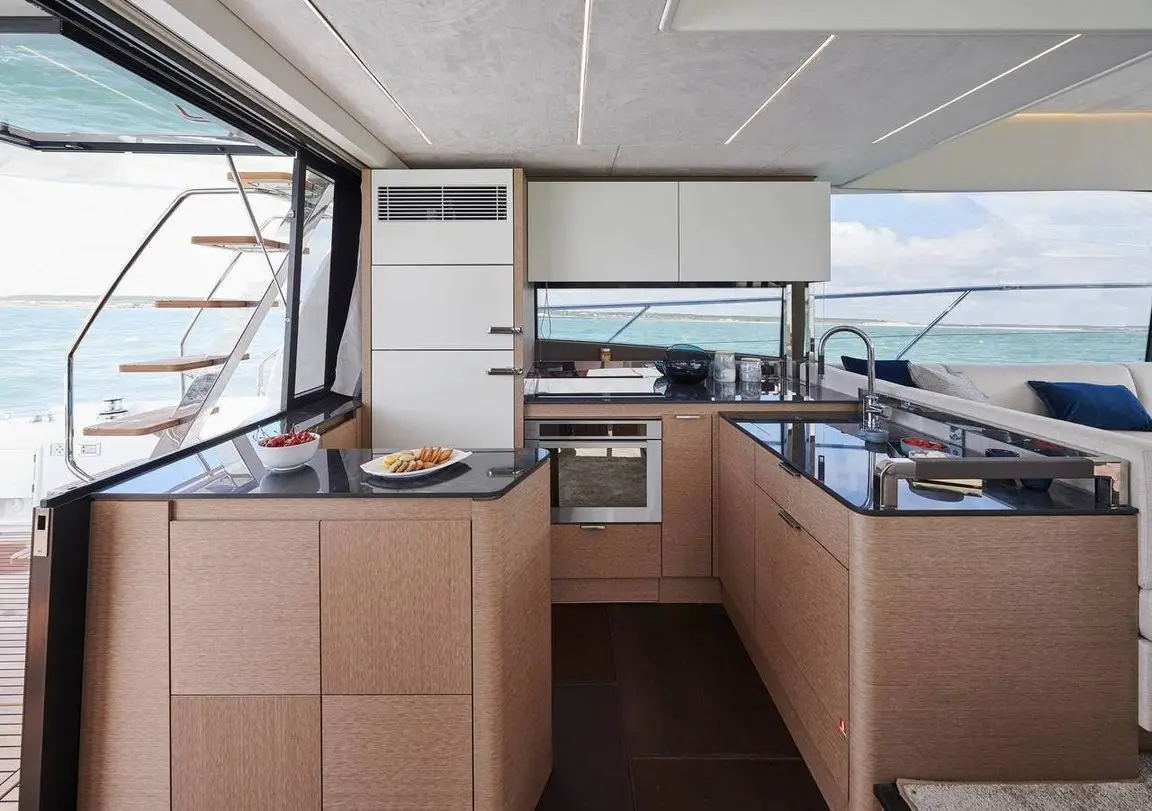 Prestige 590 Fly, master cabin — Barcelona Yacht Rental, Barcelona. Sitges coves by day, flybridge sunsets by dusk