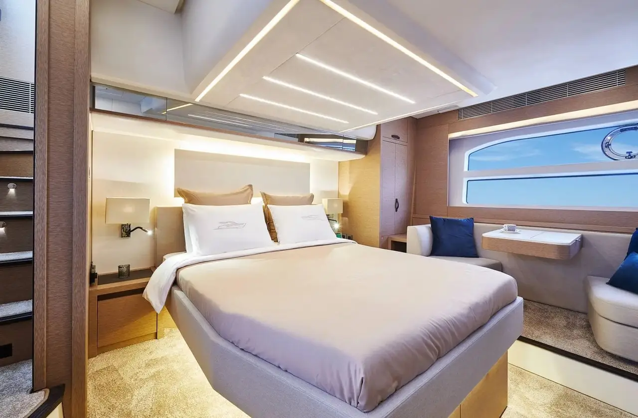 Prestige 590 Fly, flybridge — Barcelona Yacht Rental, Barcelona. Sitges coves by day, flybridge sunsets by dusk